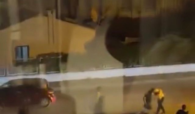 Bursa'da iki aile birbirine girdi! Cadde ortası savaş alanına döndü